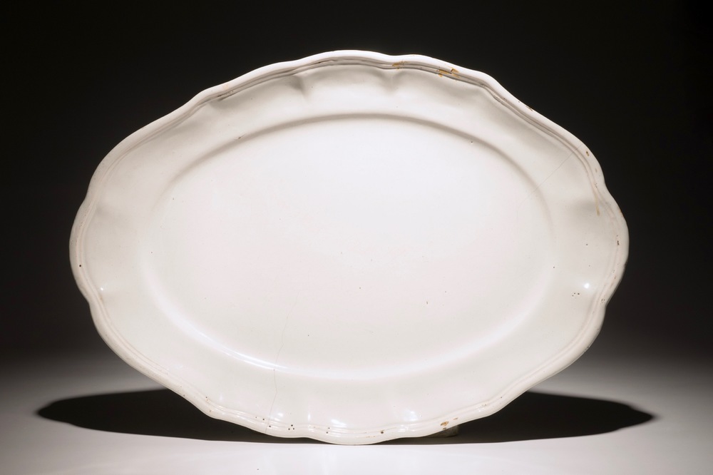 A large oval monochrome white platter, France, 18th C.